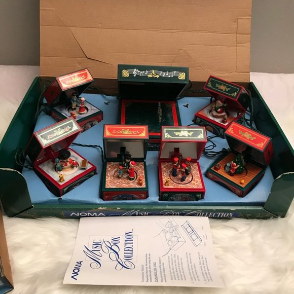 noma Other - Vintage Noma Music box Christmas Collection plays 18 songs animated.